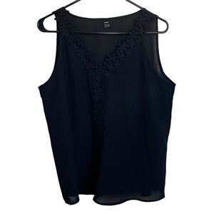 Black dressy tank with see through floral detail size L